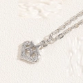 Silver heart pendant necklace with star zircon inlay on white textured background - Star Heart / Silver