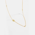 Detail view of gold letter necklace with bezel-set cubic zirconia and hollow ring elements - Letter O / 925 Sterling Silver Plated With 18k Gold