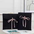 Quilted black laptop sleeve with pink ribbon bow detail in 11 and 13 inch sizes - 11" / Black