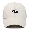 Close-up of a panda embroidery detail on a beige cotton baseball cap with high-quality stitching - Off White
