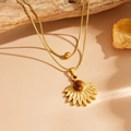 Détail du collier double rang doré avec pendentif tournesol et pierre œil de tigre brun - Oeil de Chat Demi-Tournesol Doré (K711)