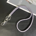 Macro shot of purple rhinestone phone lanyard with shiny silver metal lobster clasp - 6mm Rhinestone Pendant / Purple (K3138)