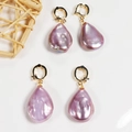 Detailed view of baroque firework pearl earrings with gold lever back clasps - Drop Shape Universal Clasp