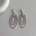 Chic silver layered oval drop earrings with minimalist polished triple ring design - Silver
