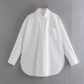 Detail of white cotton shirt with classic lapel, front pocket and curved hem - S / White