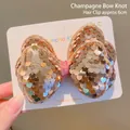 Champagne sequin bow hair clip for girls with shimmering metallic finish on 6cm clip - Champagne Bow (Hair Clip)
