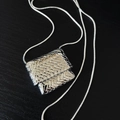 Collana in argento con ciondolo intrecciato quadrato e catena a serpente da donna - Argento