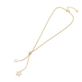 Collana lariat in acciaio dorato con nappa di perle e ciondolo a stella in madreperla - Stile Stella