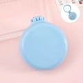Portable light blue folding hairbrush with mirror and massage cushion in Macaron style - Simple Blue Cushion Brush