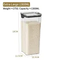 A 1300ML square airtight food storage container with a black lid filled with white rice - Extra Large 1300ml