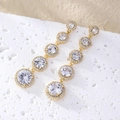 Orecchini pendenti eleganti con cinque pietre di zircone graduate in finitura dorata - Oro/Zirconia Bianca