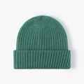 Thick emerald green knitted beanie for women featuring a ribbed cuff design and warm fabric - One Size / Malachite green