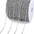 Minimalist silver stainless steel bead chain wound on a white spool for DIY jewelry - Steel Color Beaded Saturn Chain 2mm