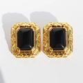 Vintage gold-tone earrings featuring a rectangular black stone with ornate relief edges - Vintage Black Rectangular Gem (Style 7) Clip-on