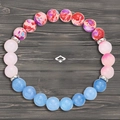 Elastic natural stone bead bracelet with colorful marble effect and blue accent beads - Love