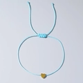 Adjustable light blue woven bracelet featuring a golden heart-shaped metal charm - Minimalist Blue String Gold Heart (QT-B23120910E)