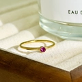 Minimalist 18K gold plated stainless steel ring with a round magenta birthstone - February - Purple (Amethyst)