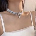 Double-layered pearl choker necklace with a crystal water drop pendant on a female model - 82#X3633 (Artificial Pearl Teardrop Pendant Necklace)