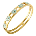 Bracelet doré avec breloques cœurs, émail œil bleu et pierres en zircone - Doré