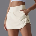 Jupe-short de tennis blanche crème à taille haute avec poches latérales pour le sport - Ivoire Clair