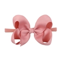Pink ribbed ribbon bow headband for babies with soft elastic nylon band on white background - Pink
