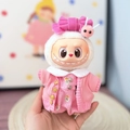 Plush doll wearing pink knitted sweater and dress with a matching pink bow accessory - Floral Set Powder / First And Second Generation Keychains Are Compatible With La Cloth Dolls. Dolls Not Included.