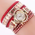 Women's quartz watch featuring a red wrap leather strap and heart-shaped rhinestone dial - Red