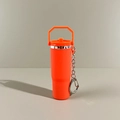 Miniature orange silicone tumbler keychain with metal ring and quick release clip - New Portable Orange
