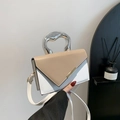 Elegant white and khaki colorblock crossbody bag with modern silver metal handle - Khaki