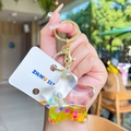 Portachiavi a stella con sabbie mobili gialle e paillettes a forma di fiori colorati - Stella Liquida (Giallo)