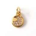 Detailed view of a gold round sun and moon pendant with shimmering inlaid zircon stones - 11-Round Pave Setting