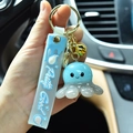 Blue resin octopus keychain with LED light and Pretty Good silicone strap - Blue