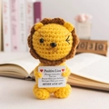 Handmade crochet yellow lion doll holding positive message card for desk decor - Sitting Lion Style 1