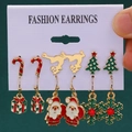 Christmas earring set with Santa, snowflake, reindeer, and tree designs on a card - 28 Gift Box Santa Snowflake (6 Pairs Set)