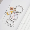 Detailed view of metal beer bottle opener keychain with letter C charm and dimensions - Letter Z