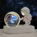 Astronaut night light with 3D laser engraved crystal ball and glowing blue light base - Sphere / Space Travel (Multicolor Light)