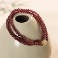 Macro shot of multi-layer red garnet beads and jade stone on a green ceramic vase - Red Garnet Hetian Jade Multi Layer Style (Including Exquisite Gift Box)