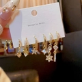 Detail of 6-piece gold earring set with zircon hearts, stars, and crosses on white card - A887 Gold