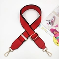 Detail of red fabric wide shoulder strap with black edges and gold metal lobster clasp - Gold Buckle / Red + Red Leather