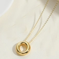 Polished 14K gold plated necklace featuring a round donut-shaped pendant on a fine chain - Letter O
