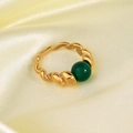 Close-up of vintage 18K gold plated rope ring featuring a round green agate gemstone - 18K Gold Emerald Style