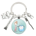 Silver metal dental keychain with toothbrush, tooth, and toothpaste charms for bags - Female Dentist Brushing Illustration (31)