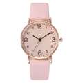 Detail view of the rose gold case and pink leather strap of this elegant quartz watch - Pink