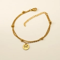Bracelet double rang en acier inoxydable doré avec un pendentif rond lettre M évidé - Lettre M (S-H202-M)