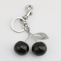 Black glitter resin cherry keychain with metallic leaf and pearl strap extension - Black Cherry with Matte Silver