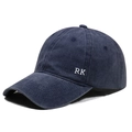 Detail of white RK side embroidery on navy washed cotton baseball cap with stitching - Adjustable / Navy Blue