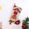 Close-up of a red and beige linen Christmas stocking featuring a 3D plush snowman doll - Snowman Style