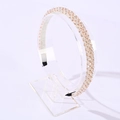 Golden handmade crystal beaded headband with transparent champagne beads on stand - White+Gold