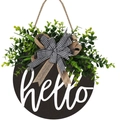 Round dark wood welcome sign with green foliage and black-white plaid bow decoration - HELLO / Black