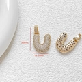 Detailed view of U-shaped gold-plated pendant with cubic zirconia and dimensions - Letter U